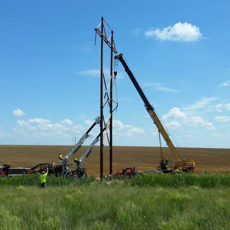 crane installing power line