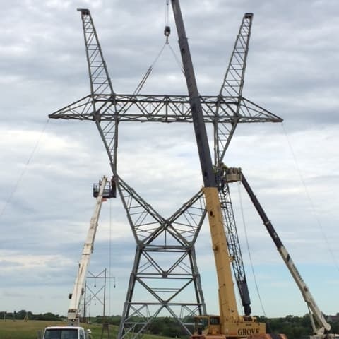 3 cranes working