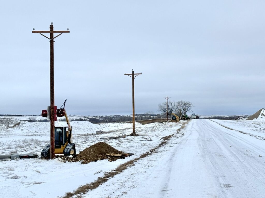 Electrical subcontractor application — transmission line crew working with Brink Constructors